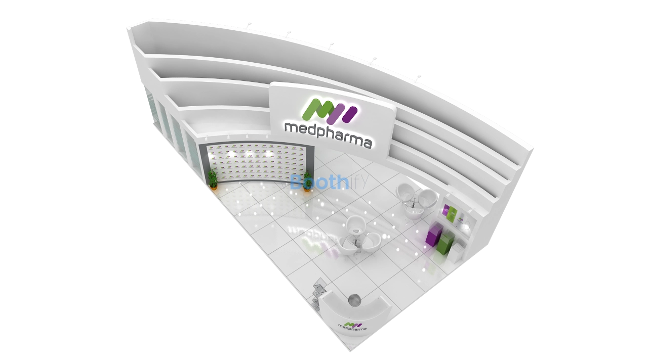 Interior close-up of an exhibition stand design showing white chairs around a glass table near frosted glass walls.